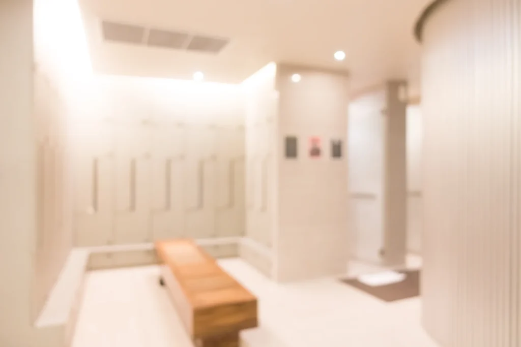 Soft-focus waiting area with a wooden bench